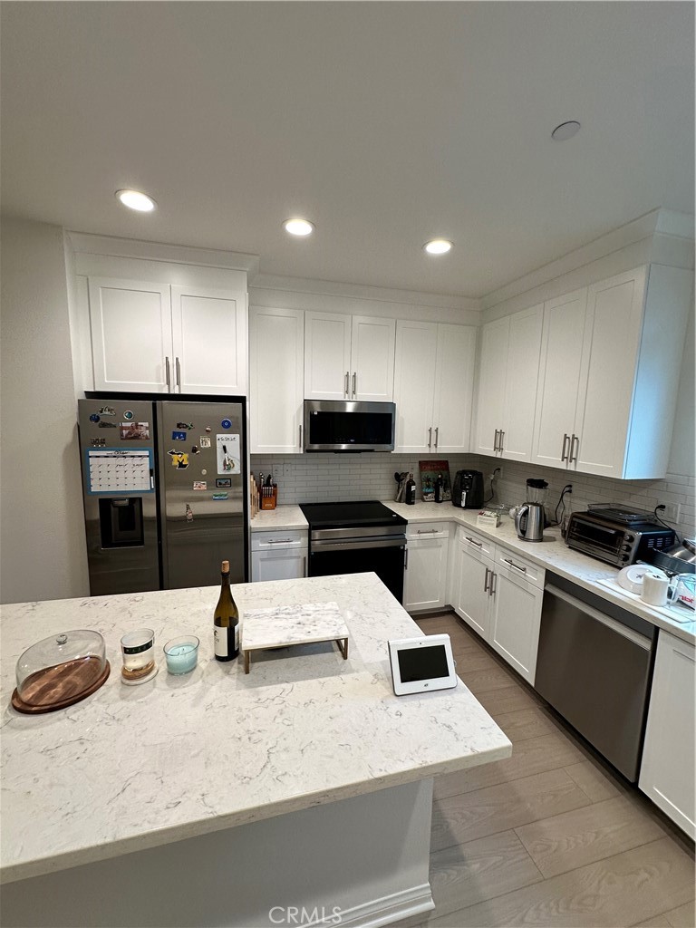 5864 Linden Avenue, Unit 3 Long Beach, CA 90805 - Photo 9 of 54 Another view of kitchen.