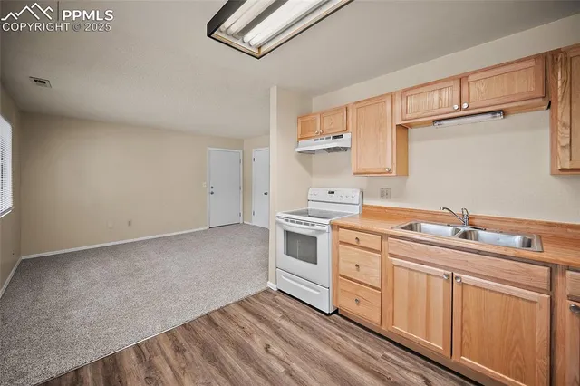 a bathroom with a sink toilet and vanity