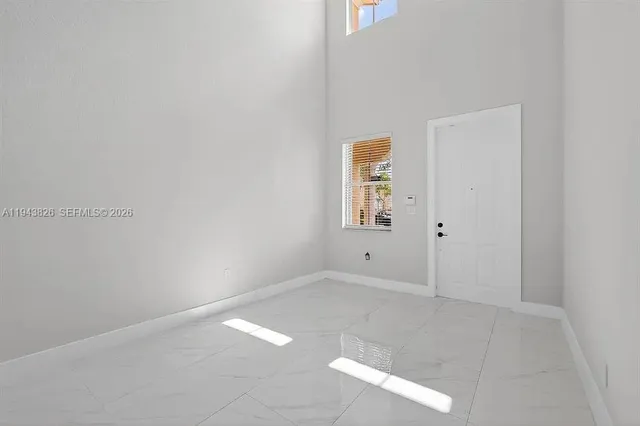 an empty room with windows