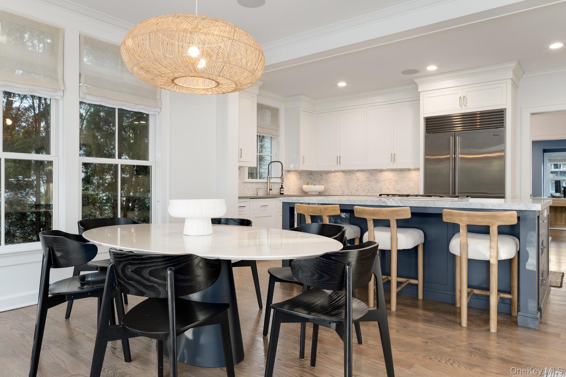 56 Intervale Place Rye, NY 10580 - Photo 12 of 29 a view of a dining room with furniture and wooden floor