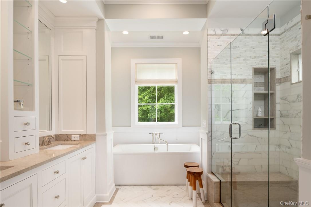 56 Intervale Place Rye, NY 10580 - Photo 17 of 29 a bathroom with a granite countertop sink a toilet and shower