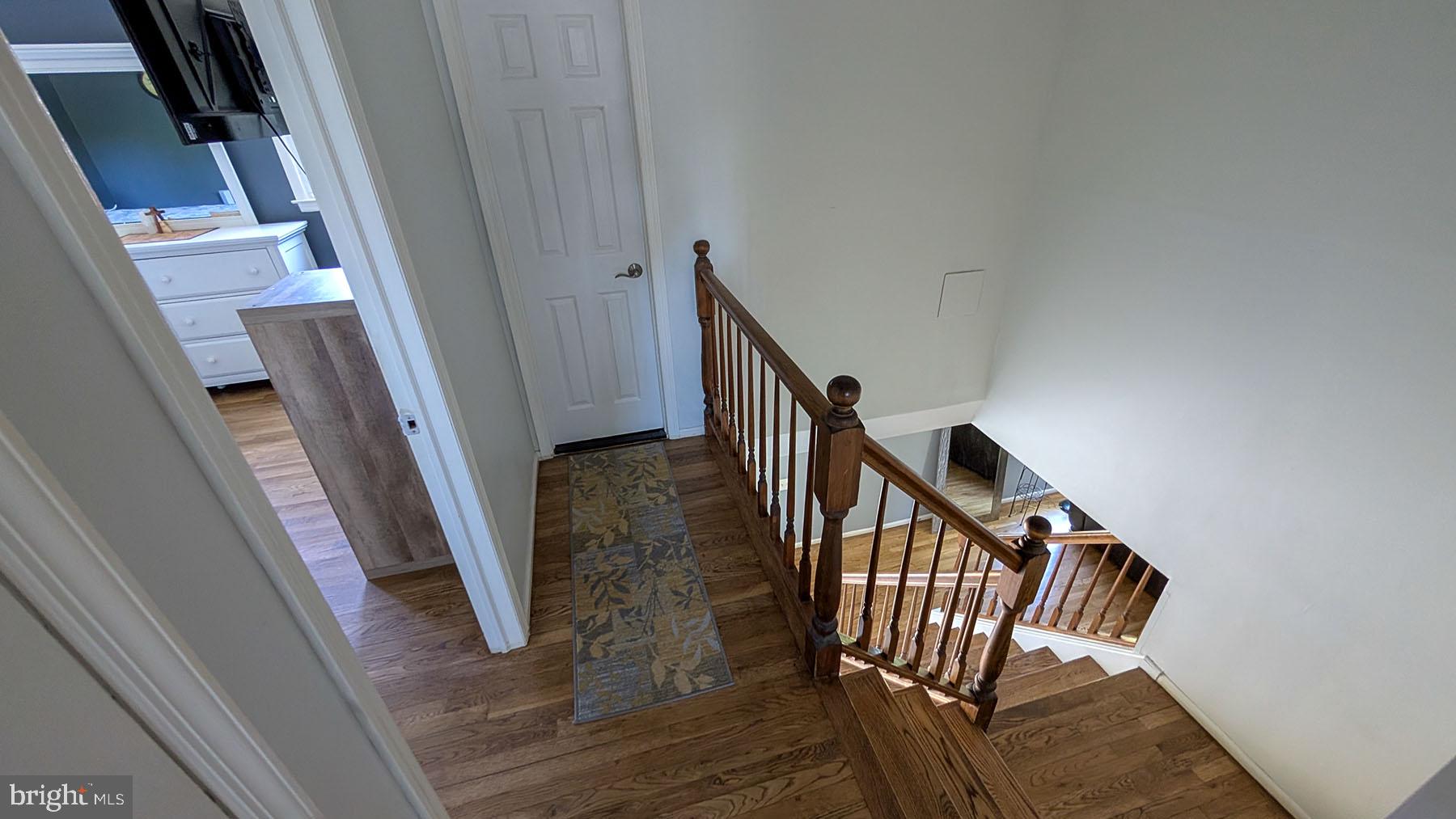 9 Wolfpack Road Hamilton, NJ 08619 - Photo 28 of 57 Inviting staircase with warm wood tones.