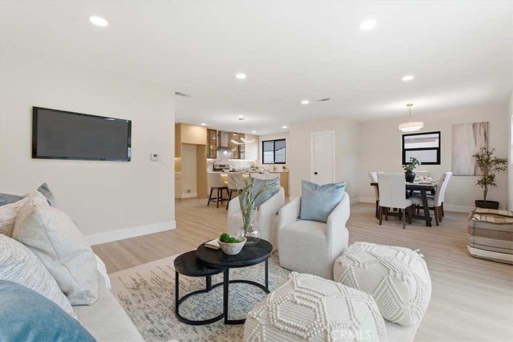 168 226th Street Carson, CA 90745 - Photo 14 of 40 a living room with furniture a view of living room and a flat screen tv