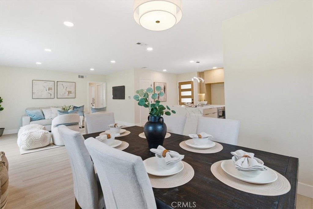 168 226th Street Carson, CA 90745 - Photo 16 of 40 a living room with furniture and a table