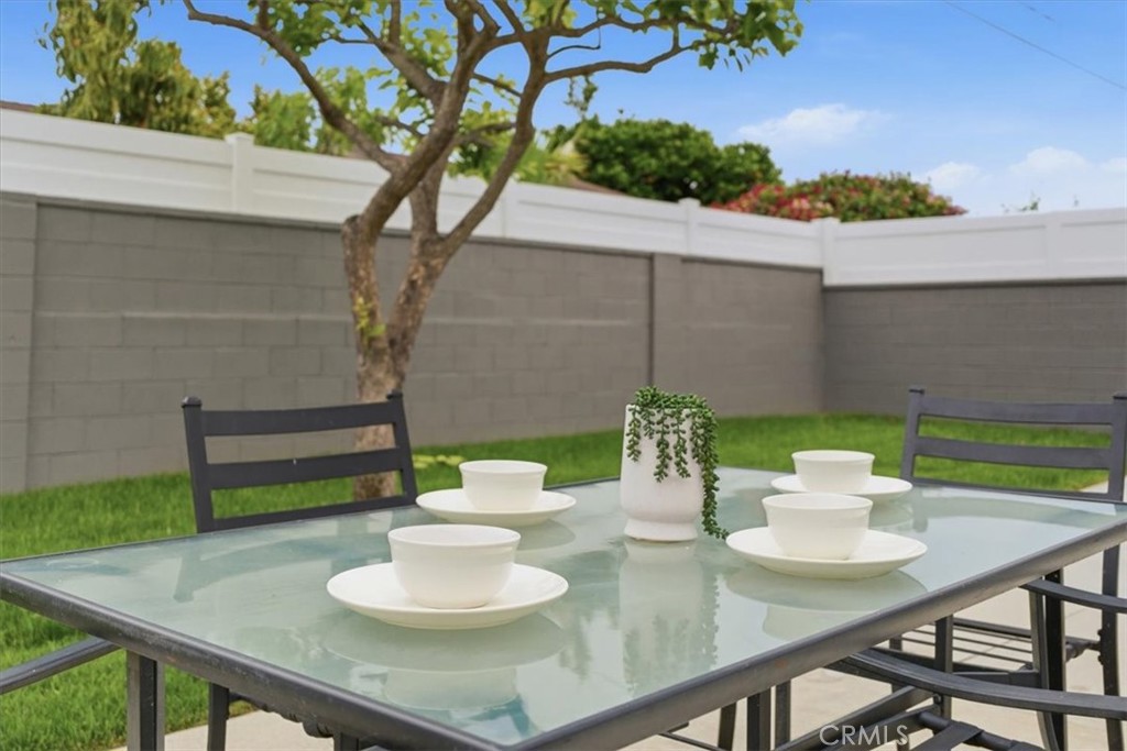 168 226th Street Carson, CA 90745 - Photo 26 of 40 a view of a dining room with furniture and a potted plant