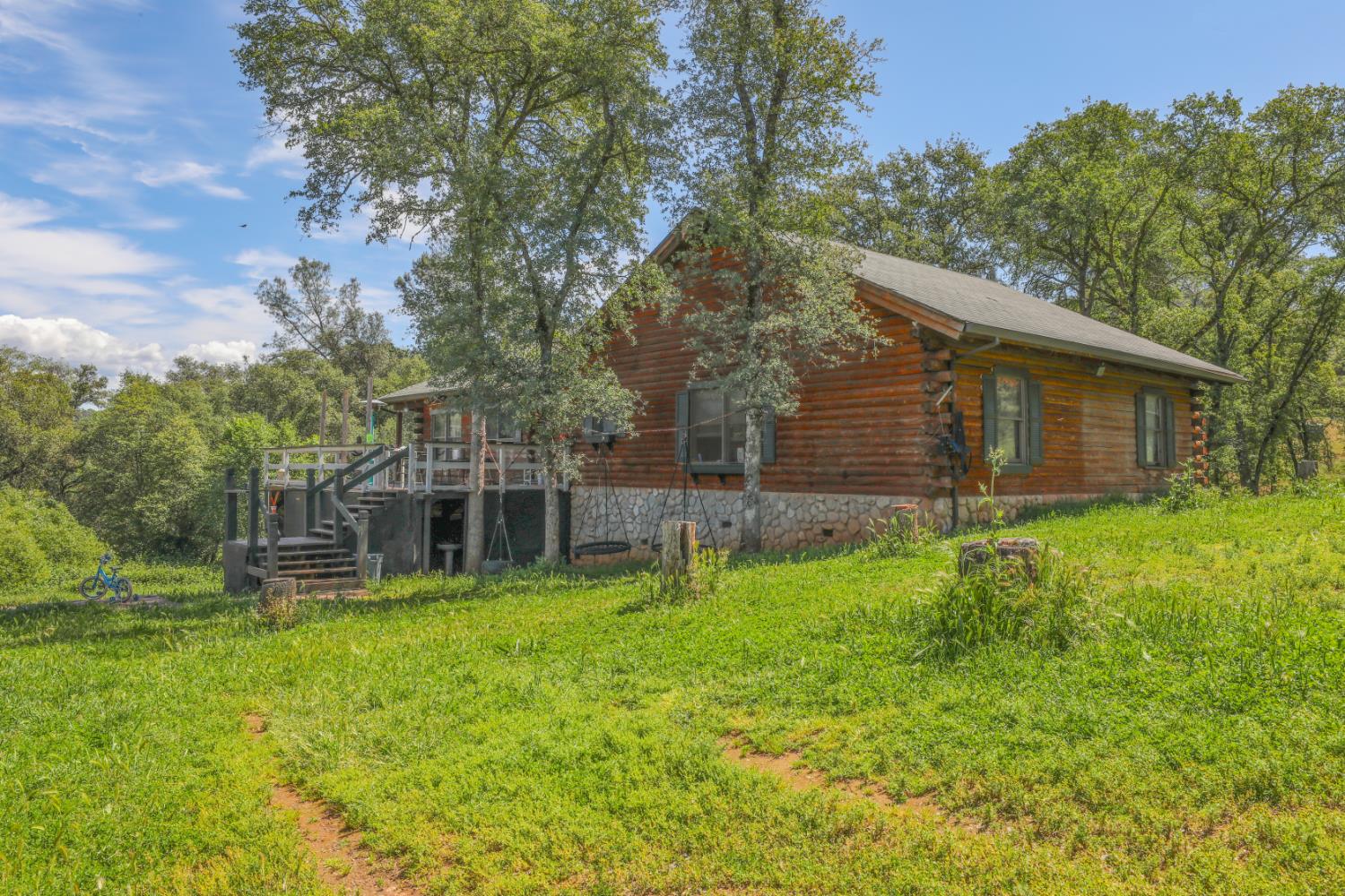 12661 Krosens Road Marysville, CA 95901 - Photo 26 of 79 a view of a house with a backyard
