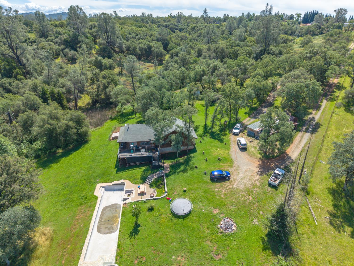 12661 Krosens Road Marysville, CA 95901 - Photo 35 of 79 an aerial view of a house with pool big yard and large trees