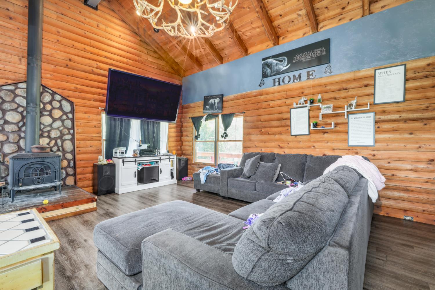 12661 Krosens Road Marysville, CA 95901 - Photo 6 of 79 a view of a patio with couches chairs and wooden floor