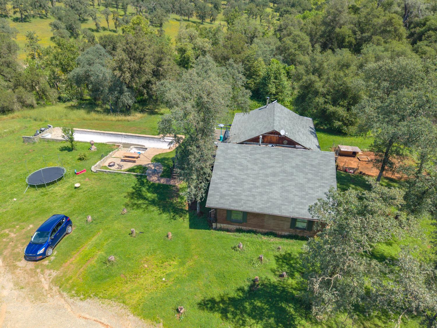12661 Krosens Road Marysville, CA 95901 - Photo 76 of 79 a aerial view of a house with pool and a yard