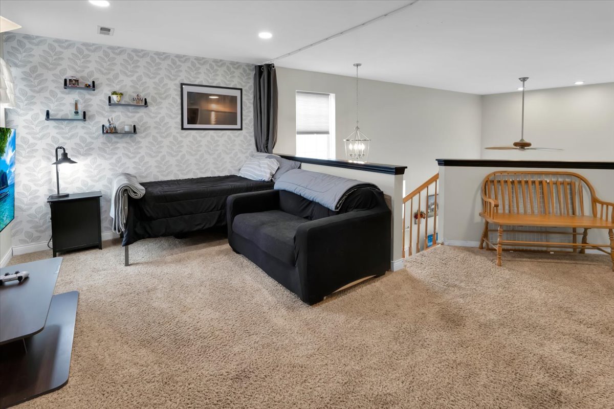 16501 Nottingham Court Lockport, IL 60441 - Photo 23 of 44 a living room with furniture and a bathtub