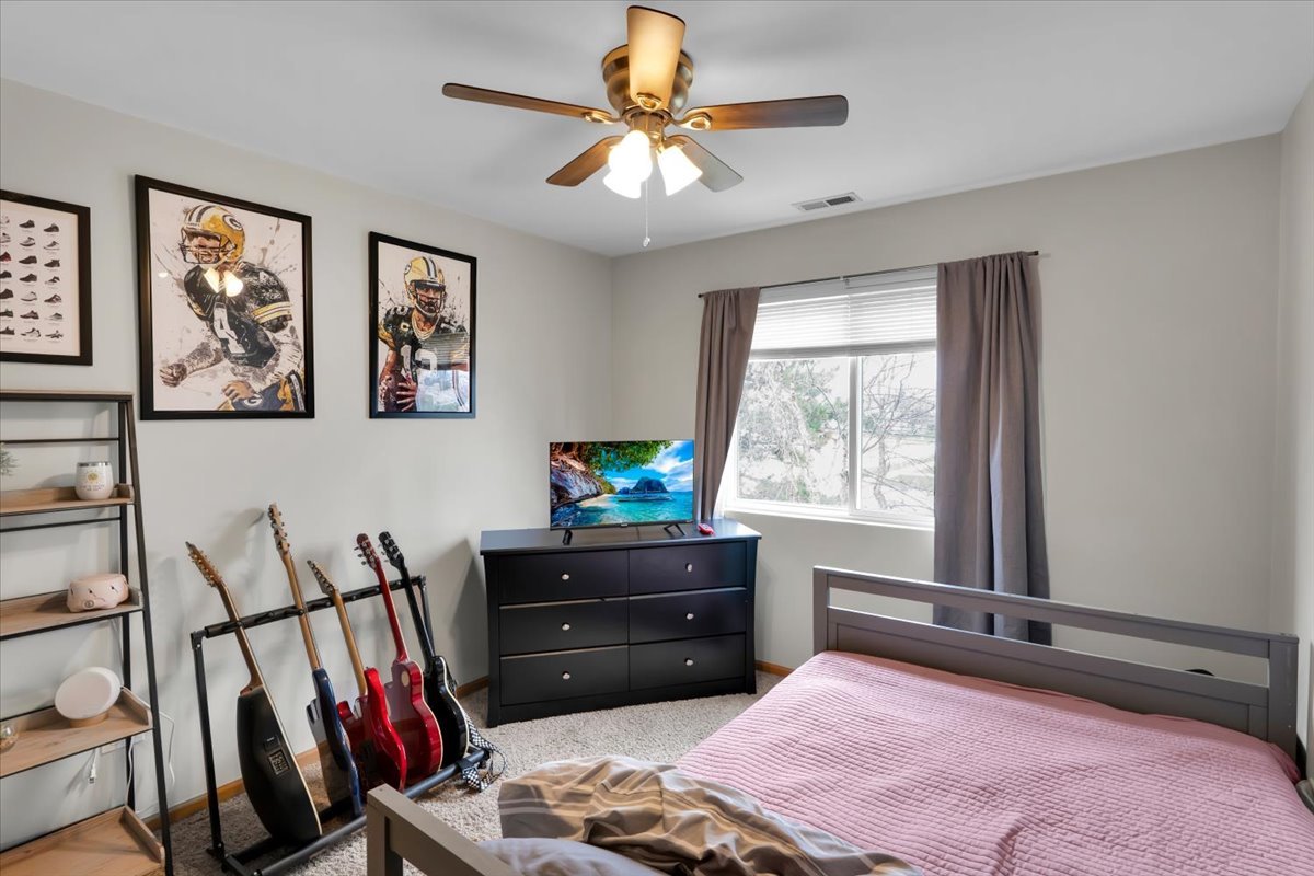 16501 Nottingham Court Lockport, IL 60441 - Photo 28 of 44 a bedroom with a bed and a window