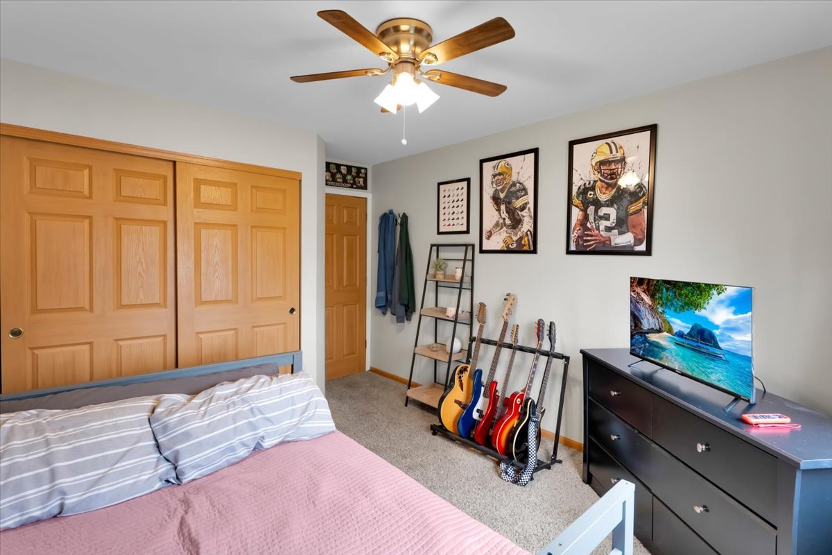 16501 Nottingham Court Lockport, IL 60441 - Photo 29 of 44 a bedroom with furniture and a flat screen tv