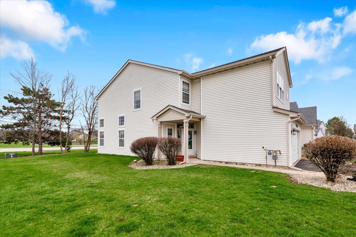 16501 Nottingham Court Lockport, IL 60441 - Photo 3 of 44 a front view of house with yard and outdoor seating