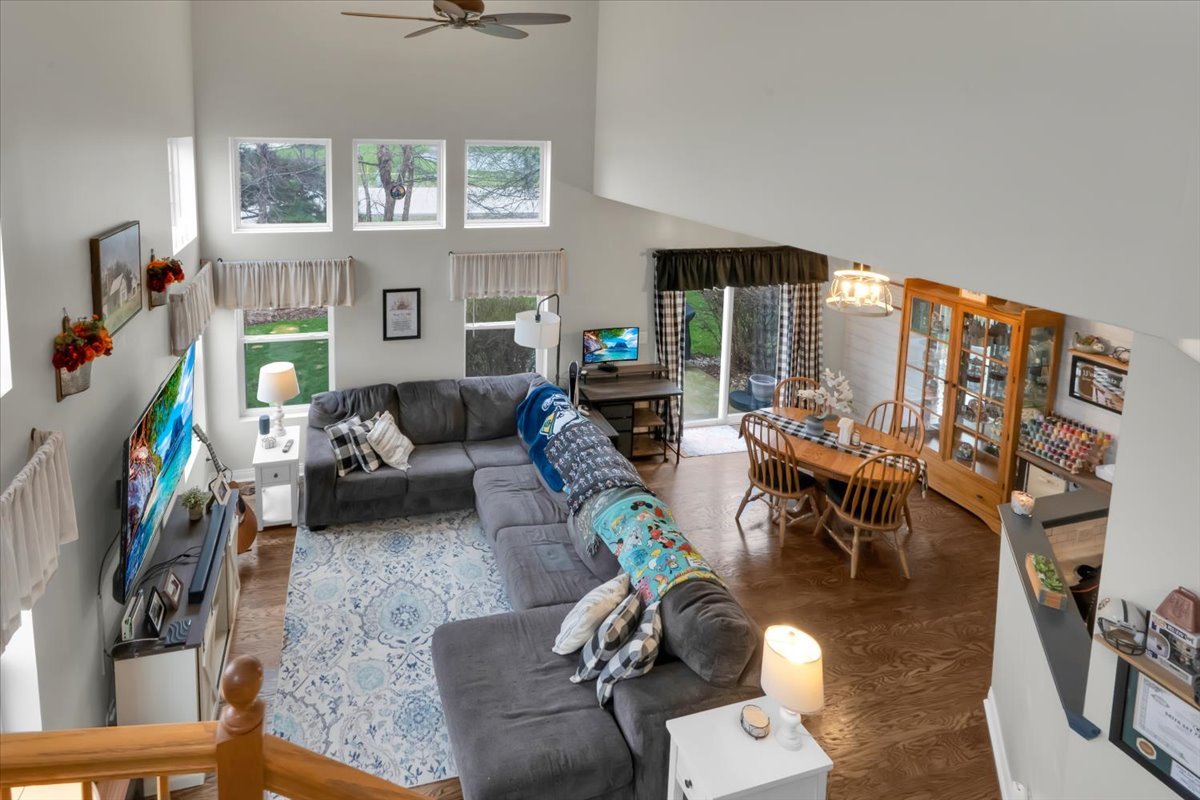 16501 Nottingham Court Lockport, IL 60441 - Photo 4 of 44 a living room with furniture and a floor to ceiling window