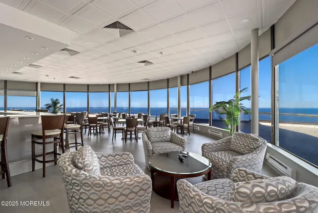 a dining hall with furniture window and view