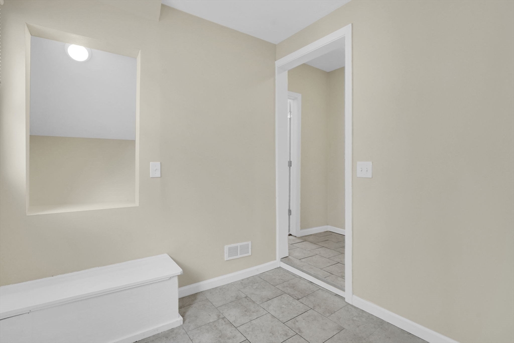 38 Whitman Street Chicopee, MA 01013 - Photo 14 of 29 a bathroom with a bathtub