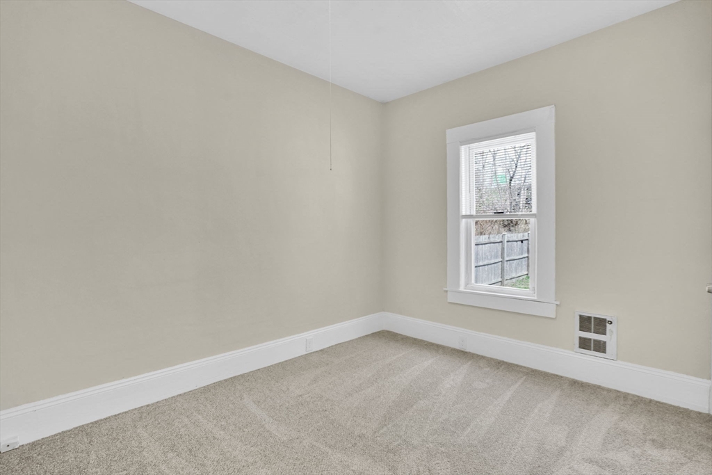 38 Whitman Street Chicopee, MA 01013 - Photo 15 of 29 an empty room with a window