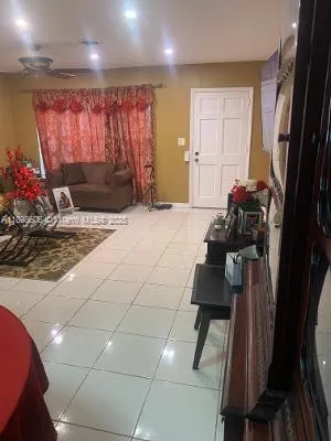 a room with furniture and a window