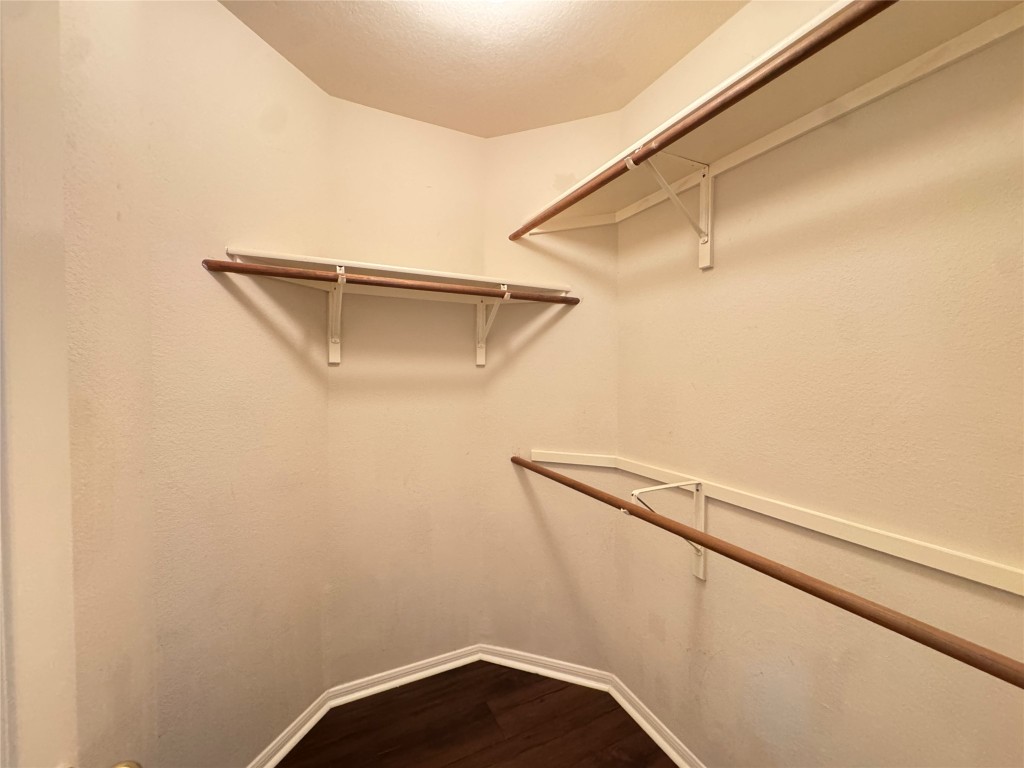 3404 Bratton Ridge Crossing Austin, TX 78728 - Photo 14 of 25 a view of a room with racks on the wall