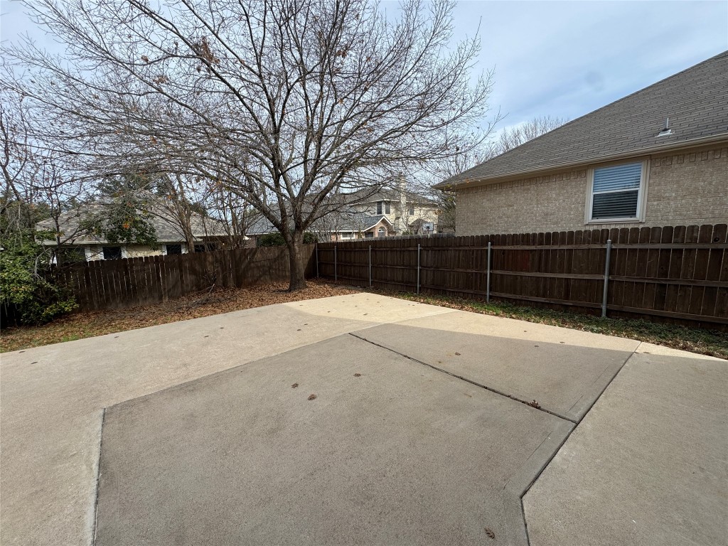 3404 Bratton Ridge Crossing Austin, TX 78728 - Photo 23 of 25 a view of backyard space with wooden fence