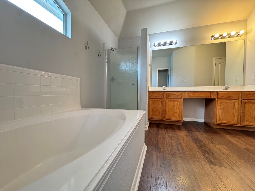 3404 Bratton Ridge Crossing Austin, TX 78728 - Photo 5 of 25 a spacious bathroom with a large tub shower and sink