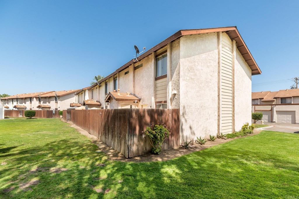 5130 North River Road, Unit F Oceanside, CA 92057 - Photo 14 of 15 a view of a back yard of the house