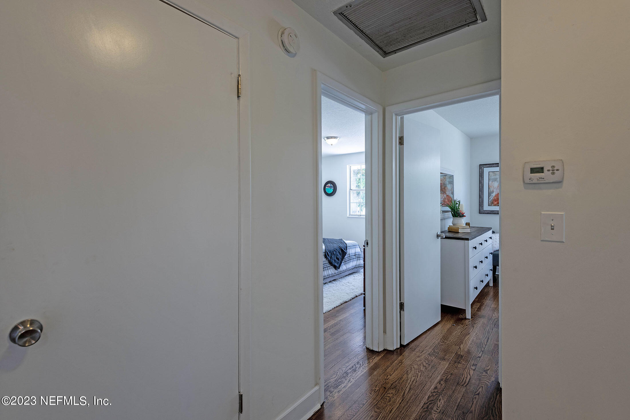 8007 Alderman Road Jacksonville, FL 32211 - Photo 26 of 63 a view of a hallway with bathroom and wooden floor