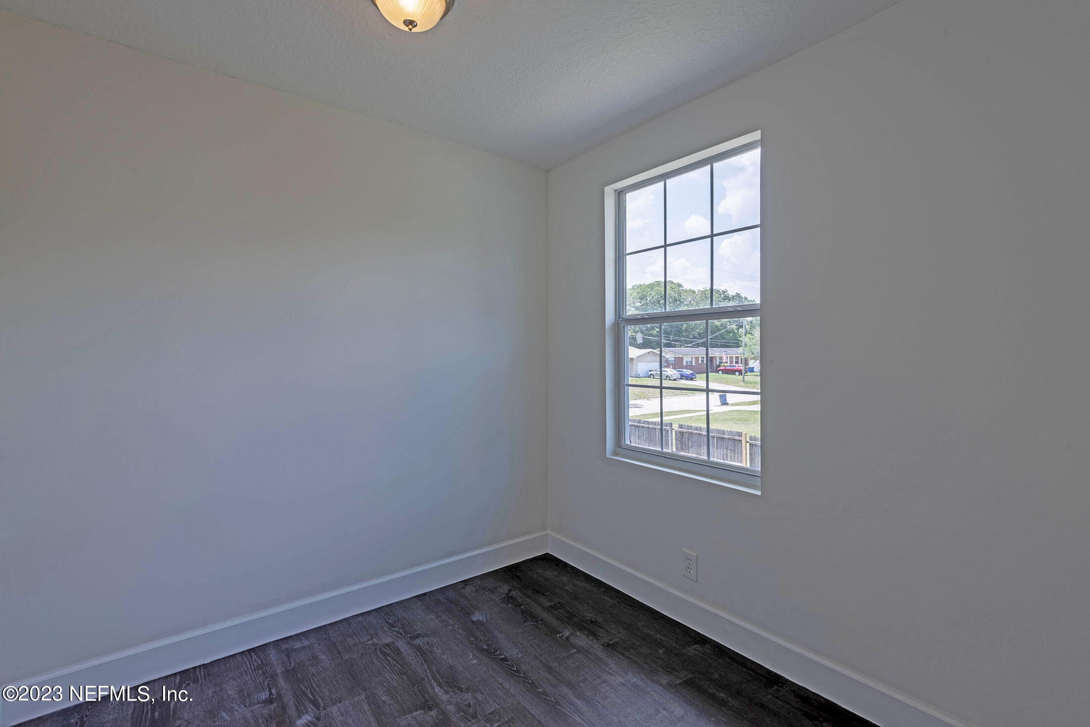 8007 Alderman Road Jacksonville, FL 32211 - Photo 34 of 63 an empty room with a window