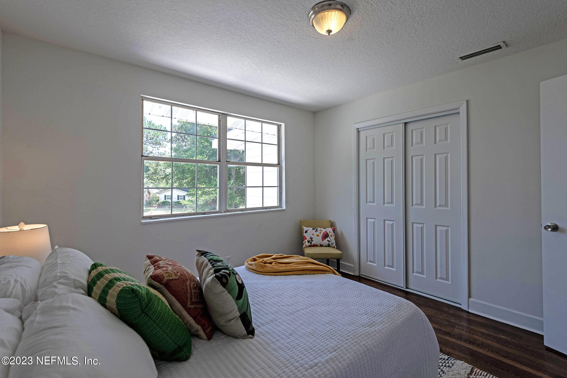 8007 Alderman Road Jacksonville, FL 32211 - Photo 41 of 63 a bedroom with a bed and a window