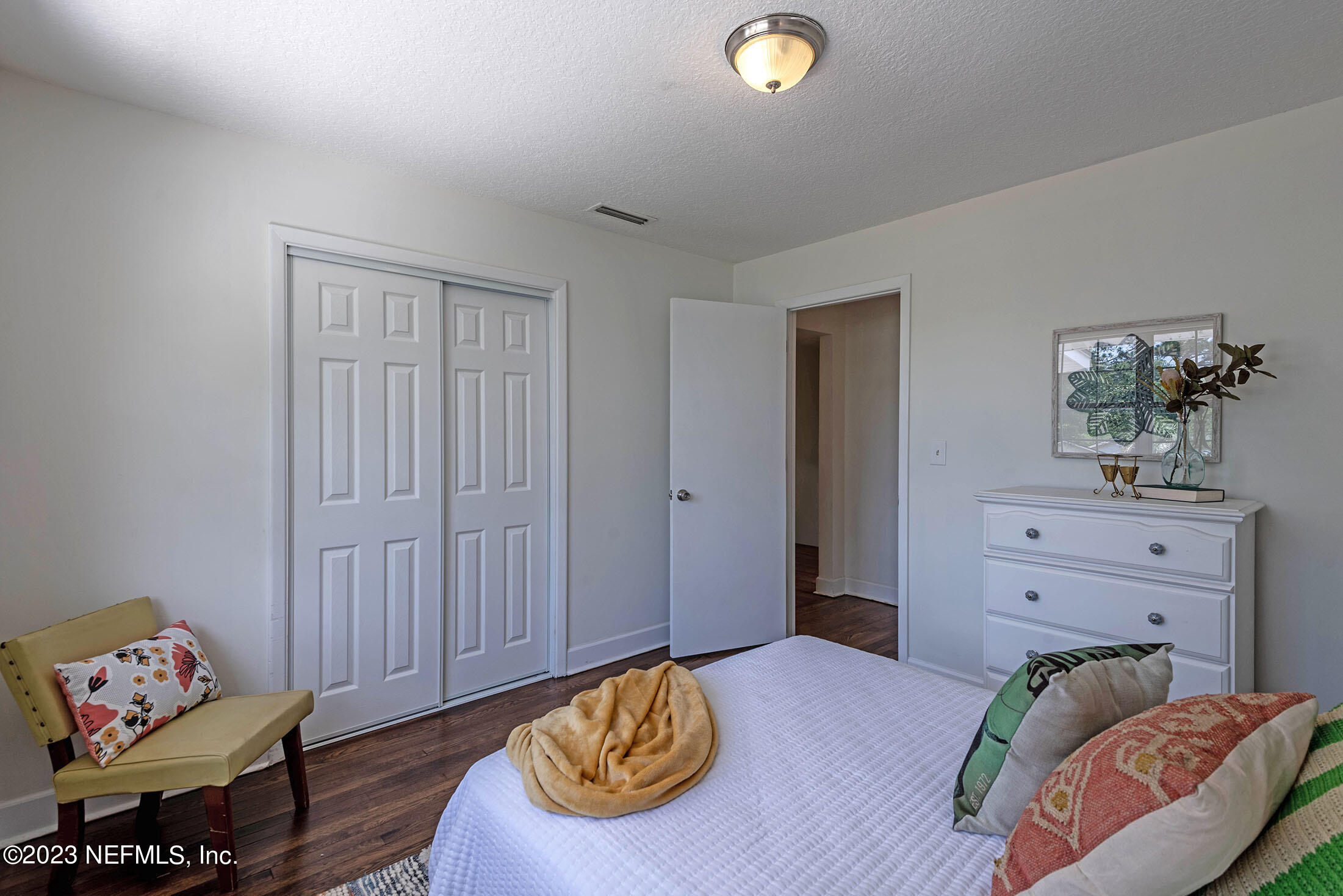 8007 Alderman Road Jacksonville, FL 32211 - Photo 42 of 63 a bedroom with a bed and furniture