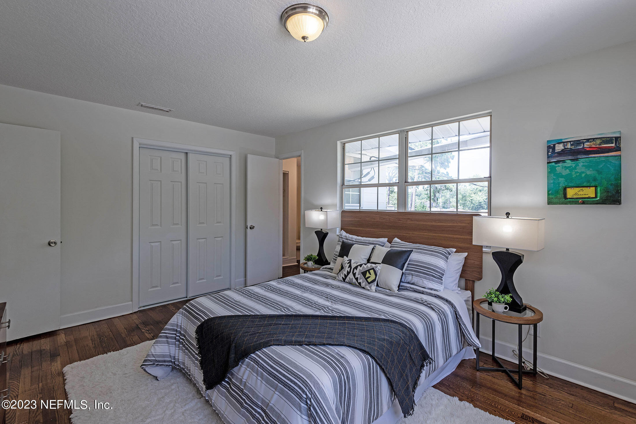 8007 Alderman Road Jacksonville, FL 32211 - Photo 46 of 63 a bedroom with a bed and a window