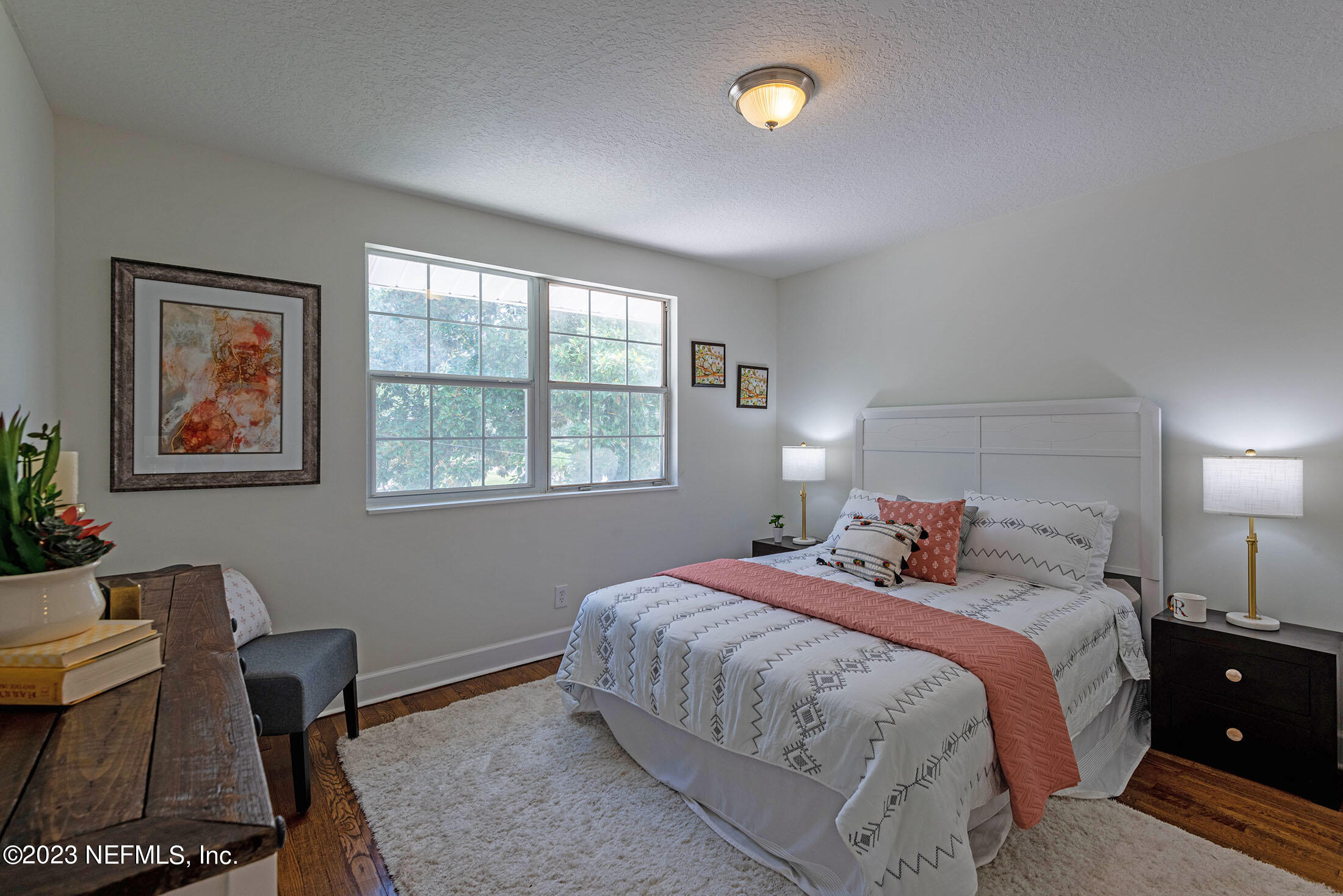8007 Alderman Road Jacksonville, FL 32211 - Photo 48 of 63 a bedroom with a bed and a window