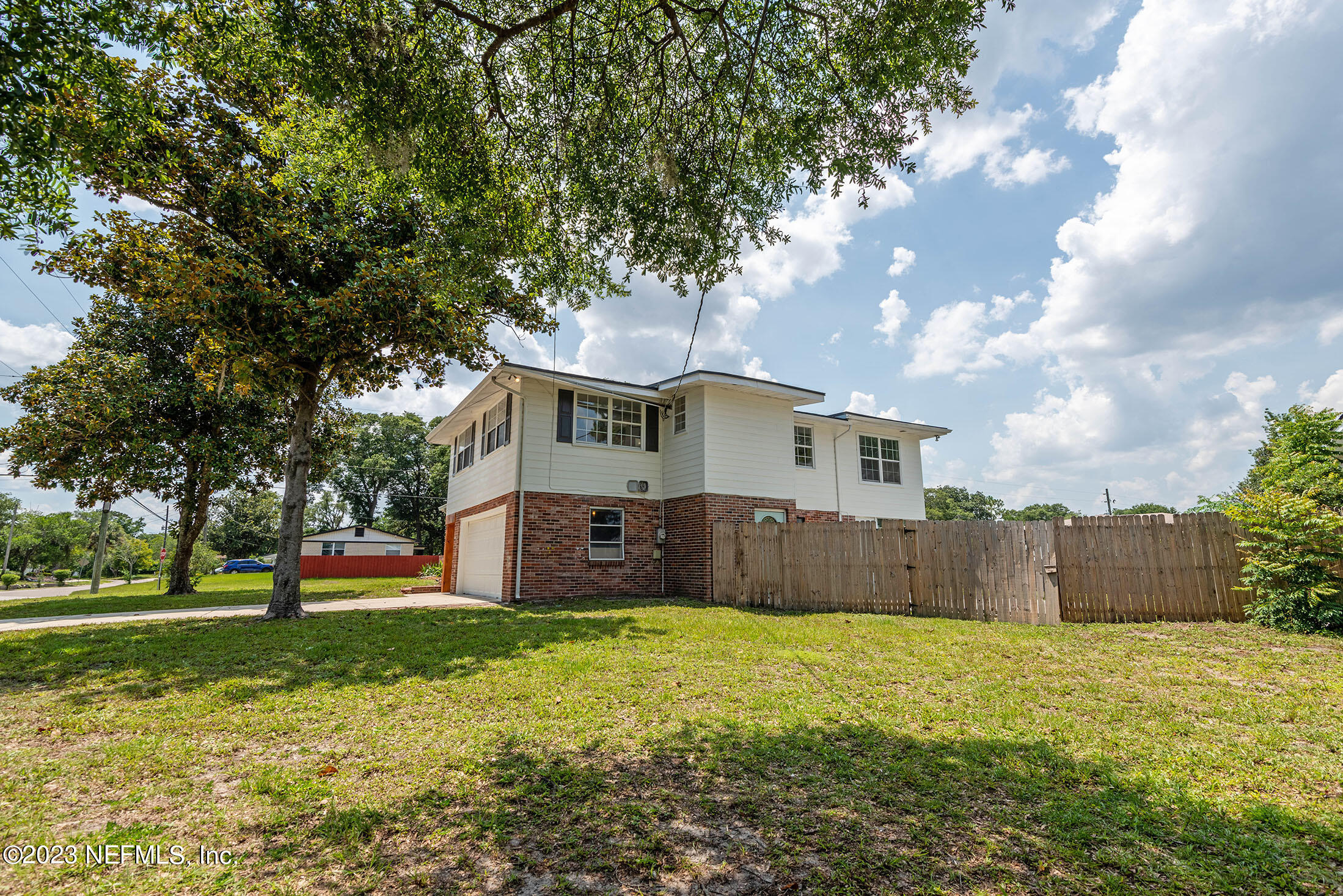 8007 Alderman Road Jacksonville, FL 32211 - Photo 55 of 63 a view of a house with a yard