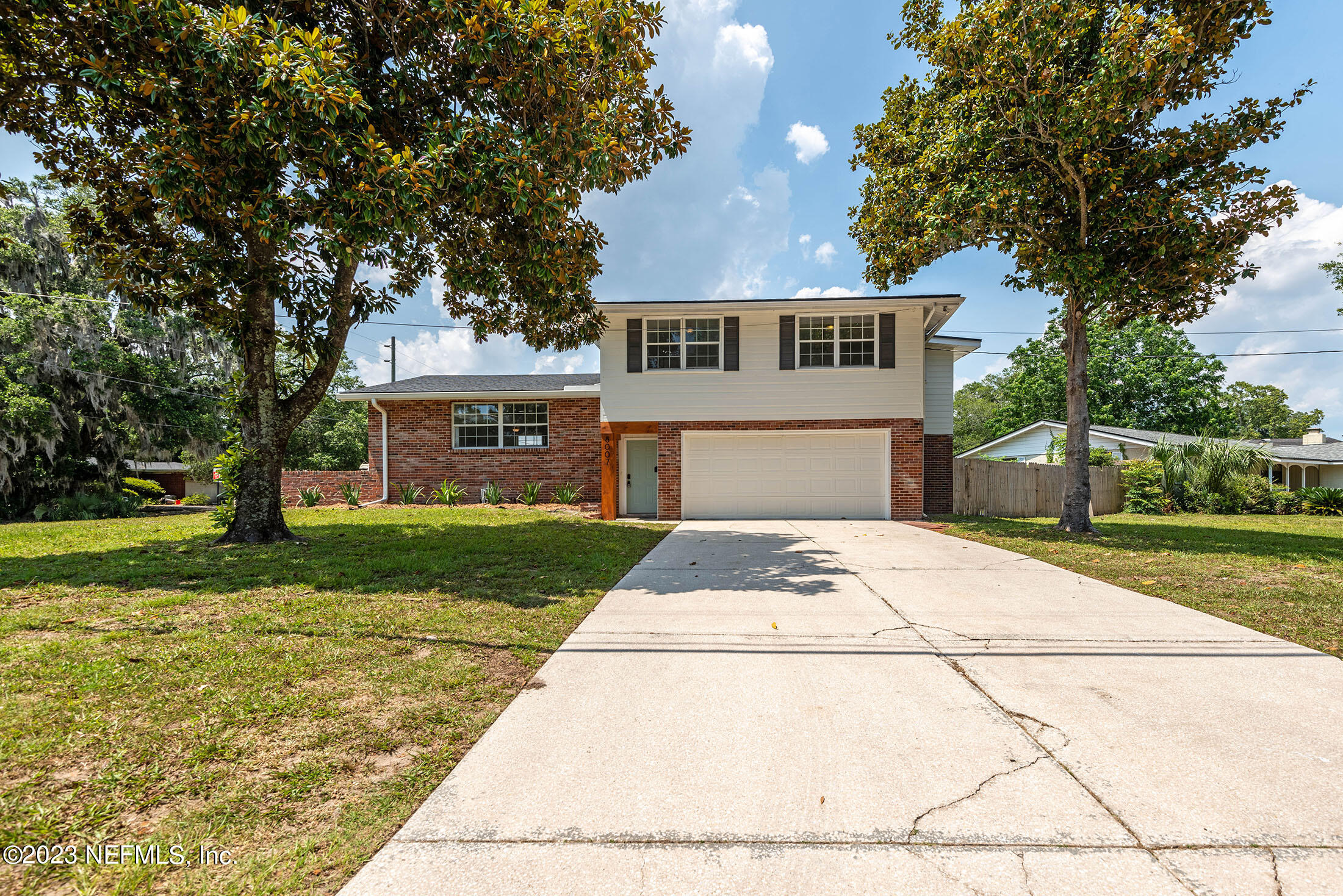 8007 Alderman Road Jacksonville, FL 32211 - Photo 56 of 63 front view of a house with a yard