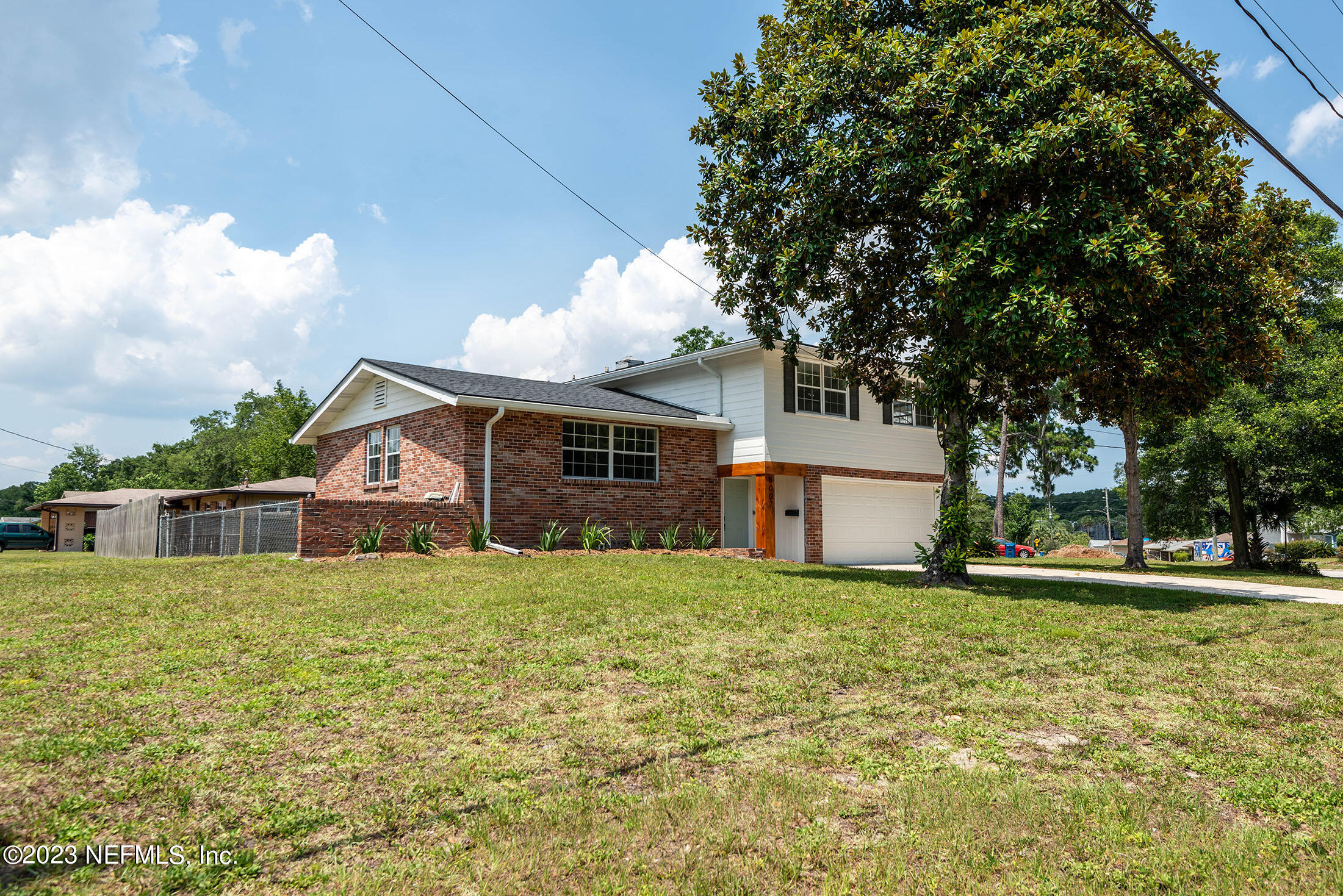 8007 Alderman Road Jacksonville, FL 32211 - Photo 60 of 63 a view of a house with a yard