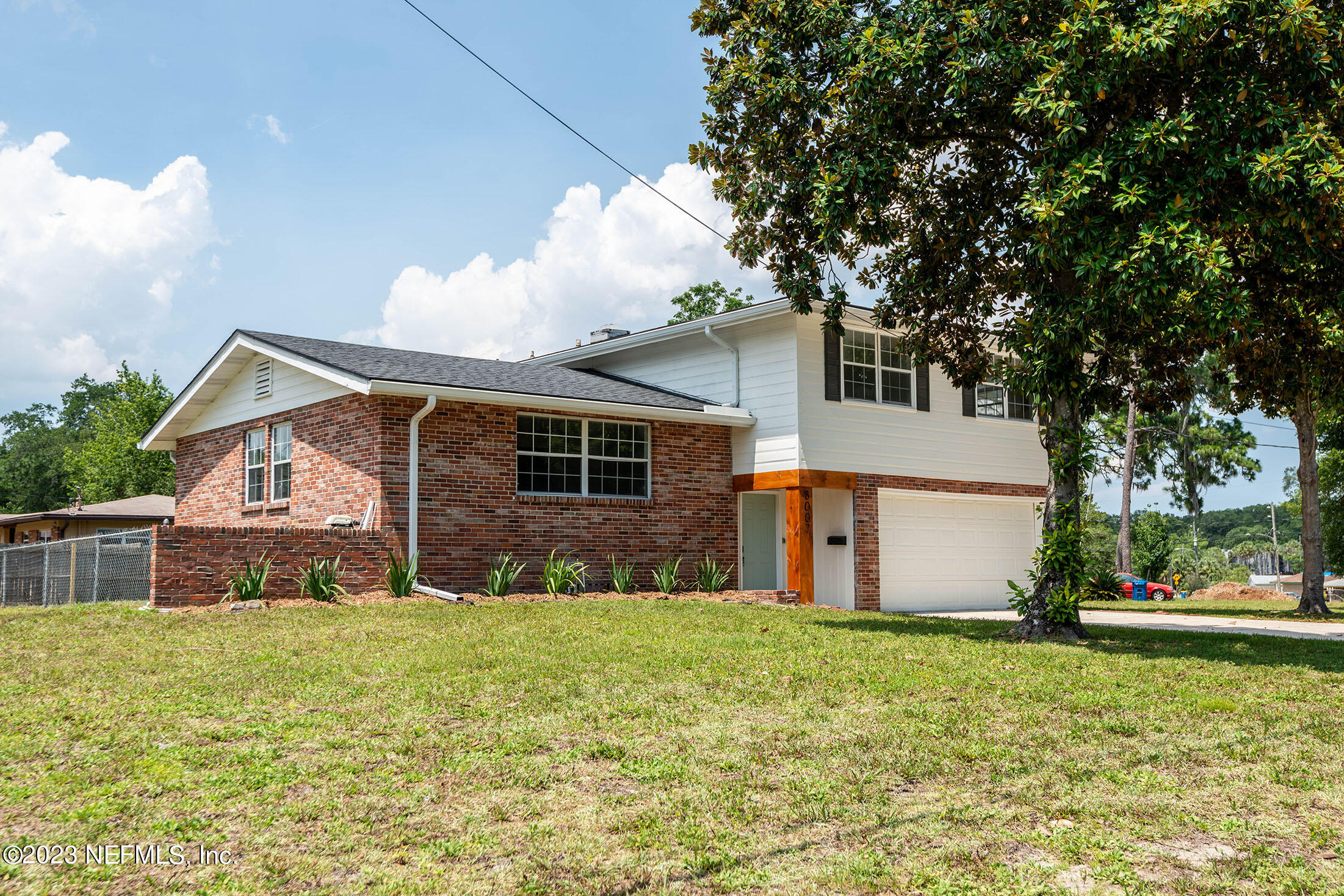 8007 Alderman Road Jacksonville, FL 32211 - Photo 61 of 63 front view of a house with a yard