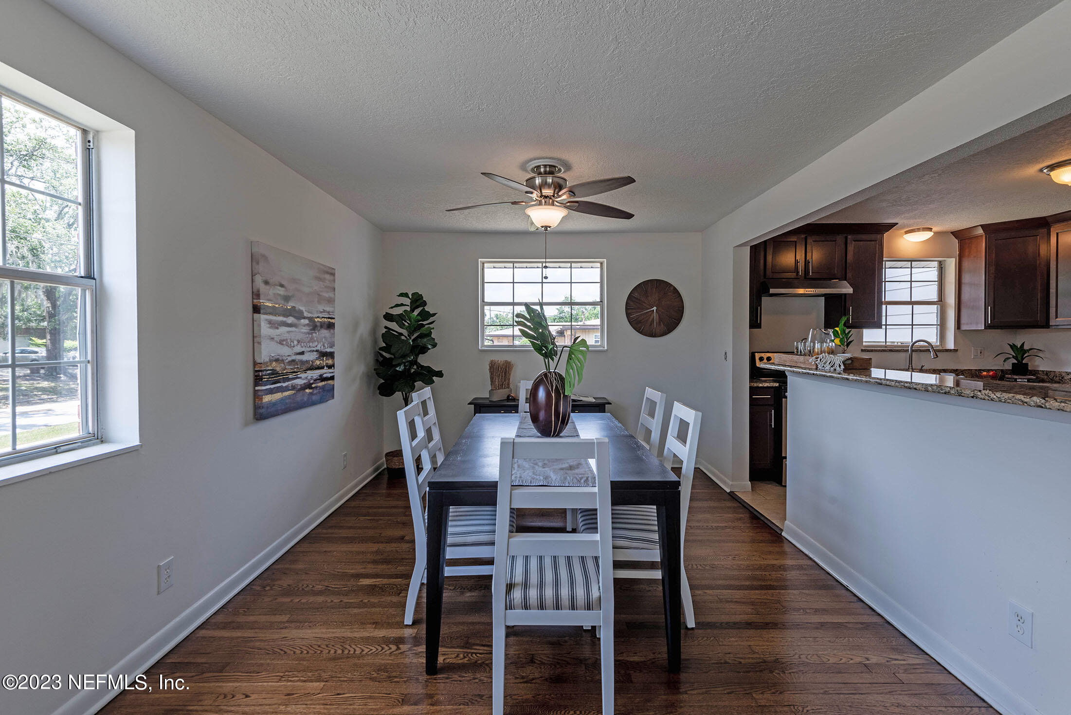 8007 Alderman Road Jacksonville, FL 32211 - Photo 7 of 63 a view of a dining room with furniture and chandelier