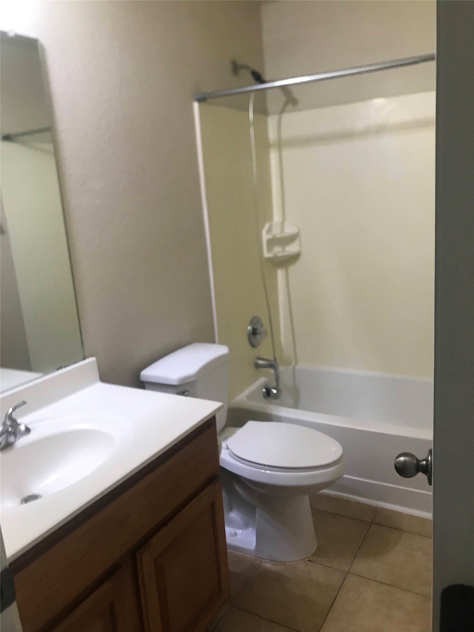 913 Rochester Castle Way Pflugerville, TX 78660 - Photo 20 of 25 Functional bathroom featuring a shower-tub combination and a practical vanity.