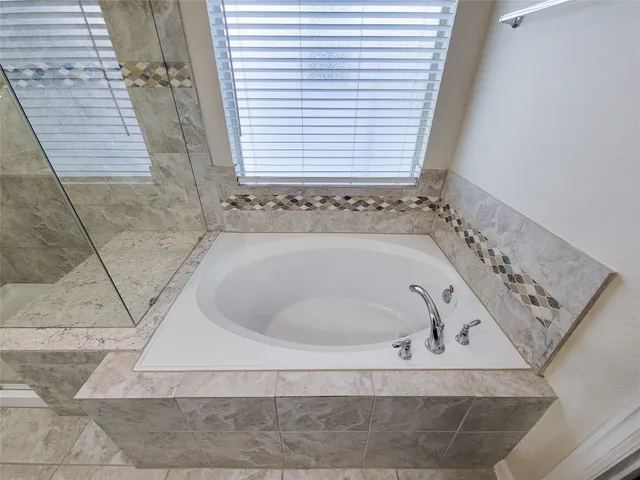 a bathroom with a bathtub