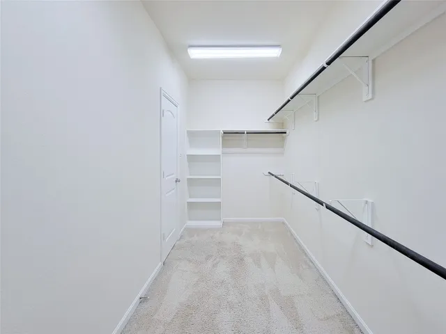 a view of hallway with stairs