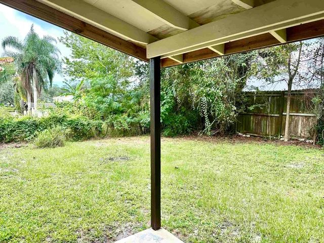 a view of a backyard with garden