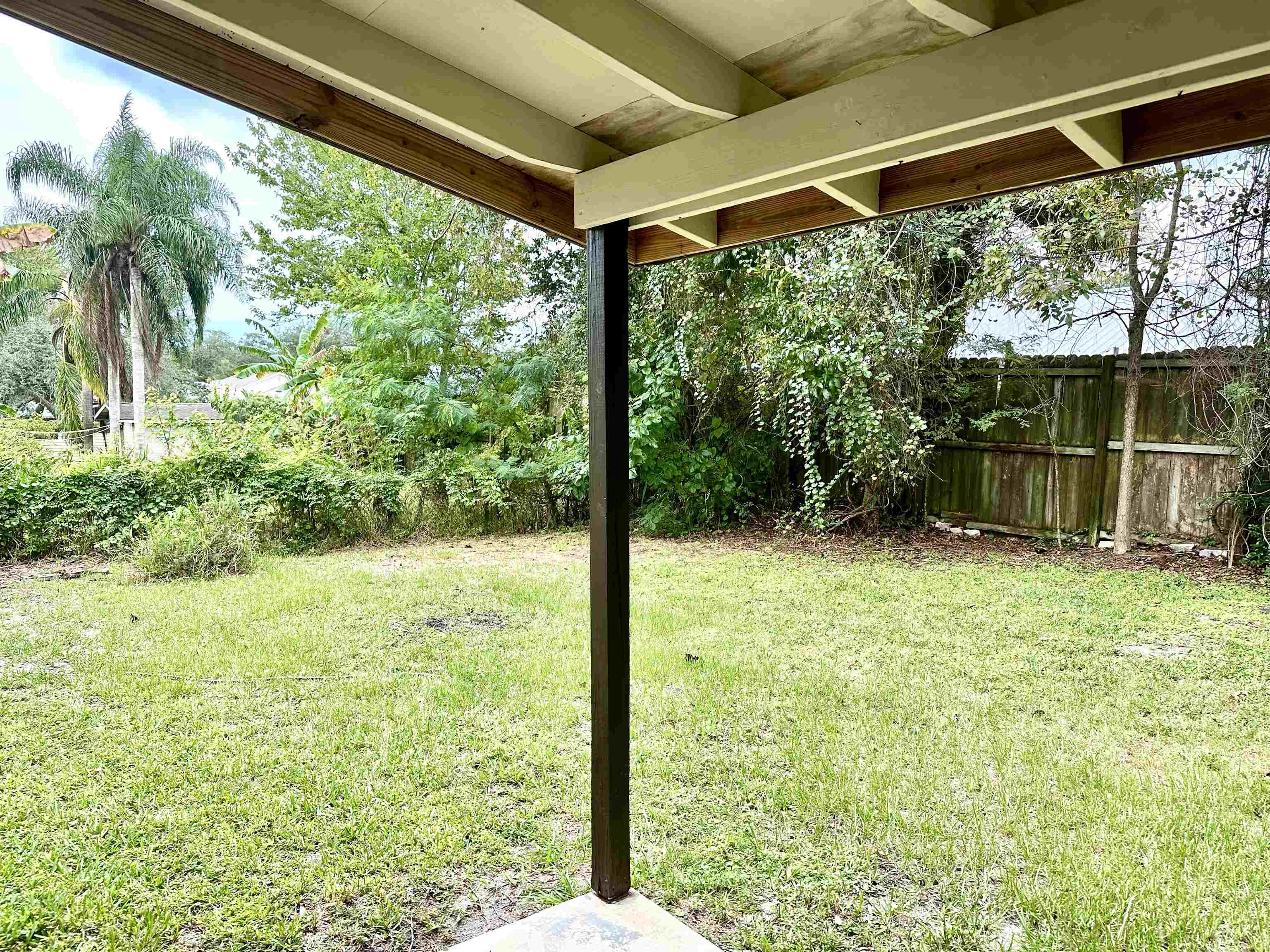 120 Vassar Road St. Augustine South, FL 32086 - Photo 23 of 24 a view of a backyard with garden