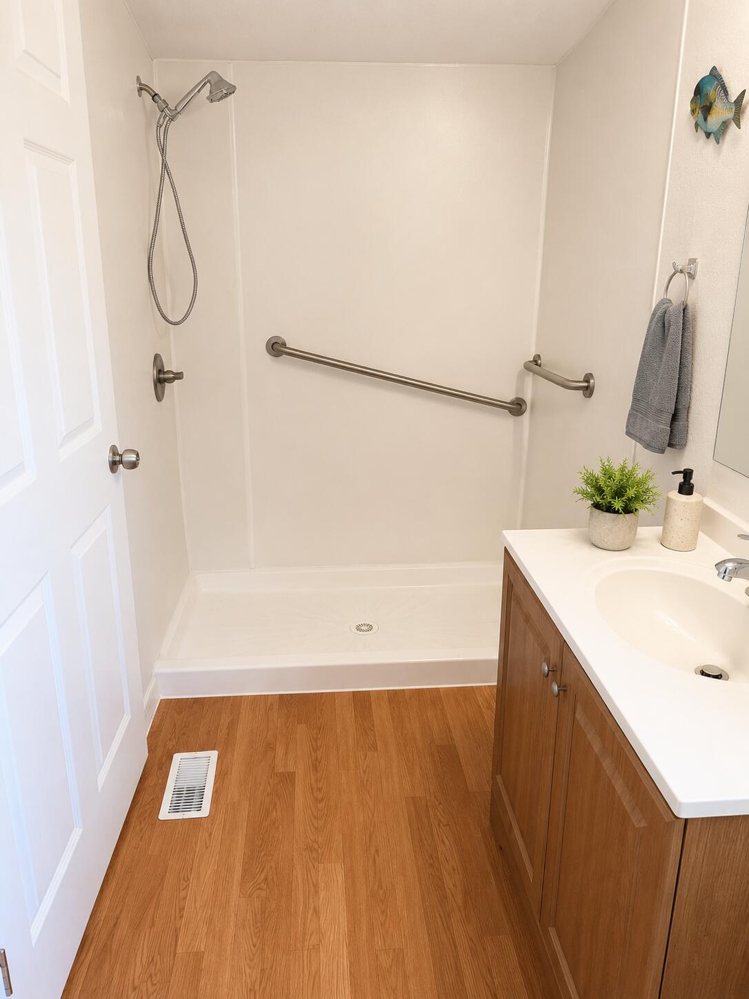 2547 Chatham Way Northeast Palm Bay, FL 32905 - Photo 14 of 24 a bathroom with a sink and a shower
