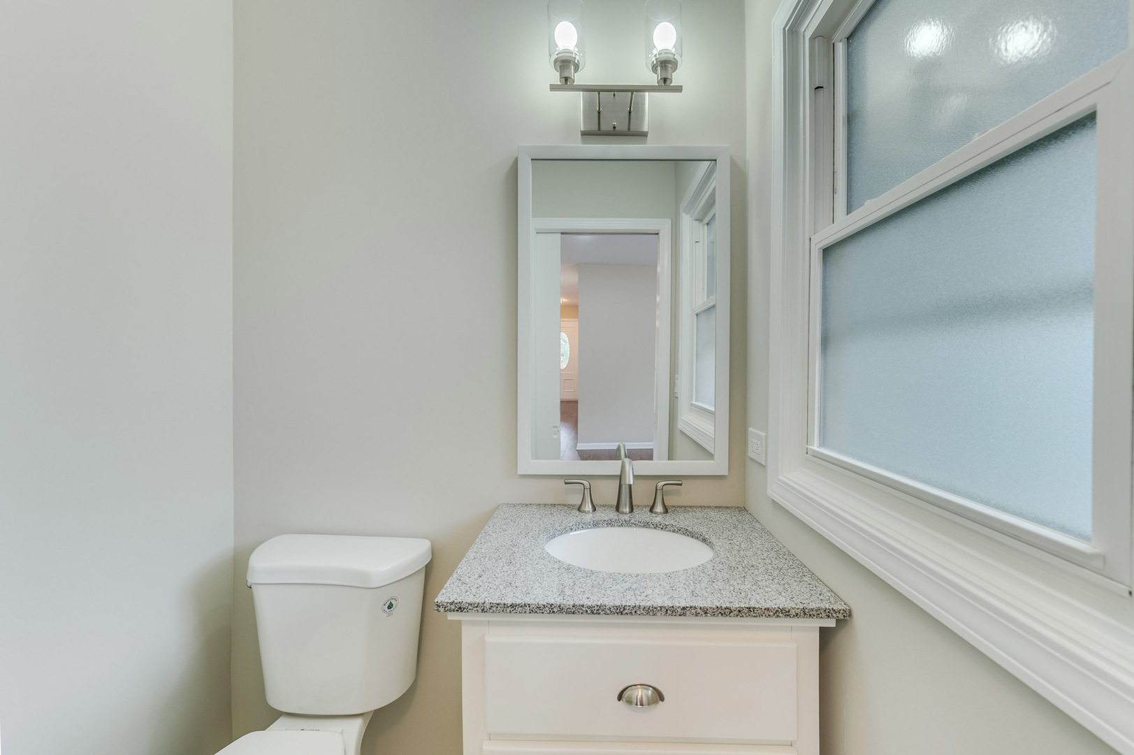 16539 Timberview Drive Plainfield, IL 60586 - Photo 13 of 26 a bathroom with a granite countertop toilet sink and mirror