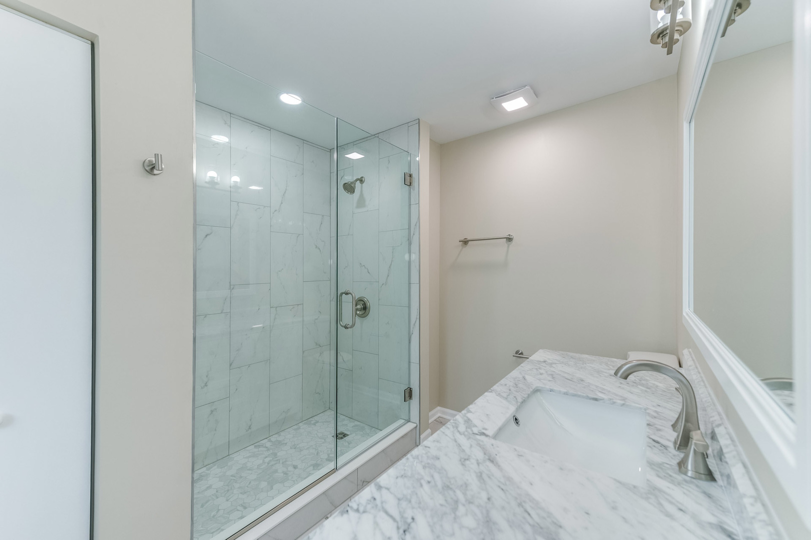 16539 Timberview Drive Plainfield, IL 60586 - Photo 16 of 26 a bathroom with a shower and sink