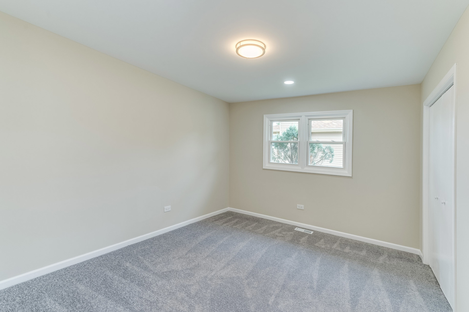 16539 Timberview Drive Plainfield, IL 60586 - Photo 17 of 26 an empty room with a window
