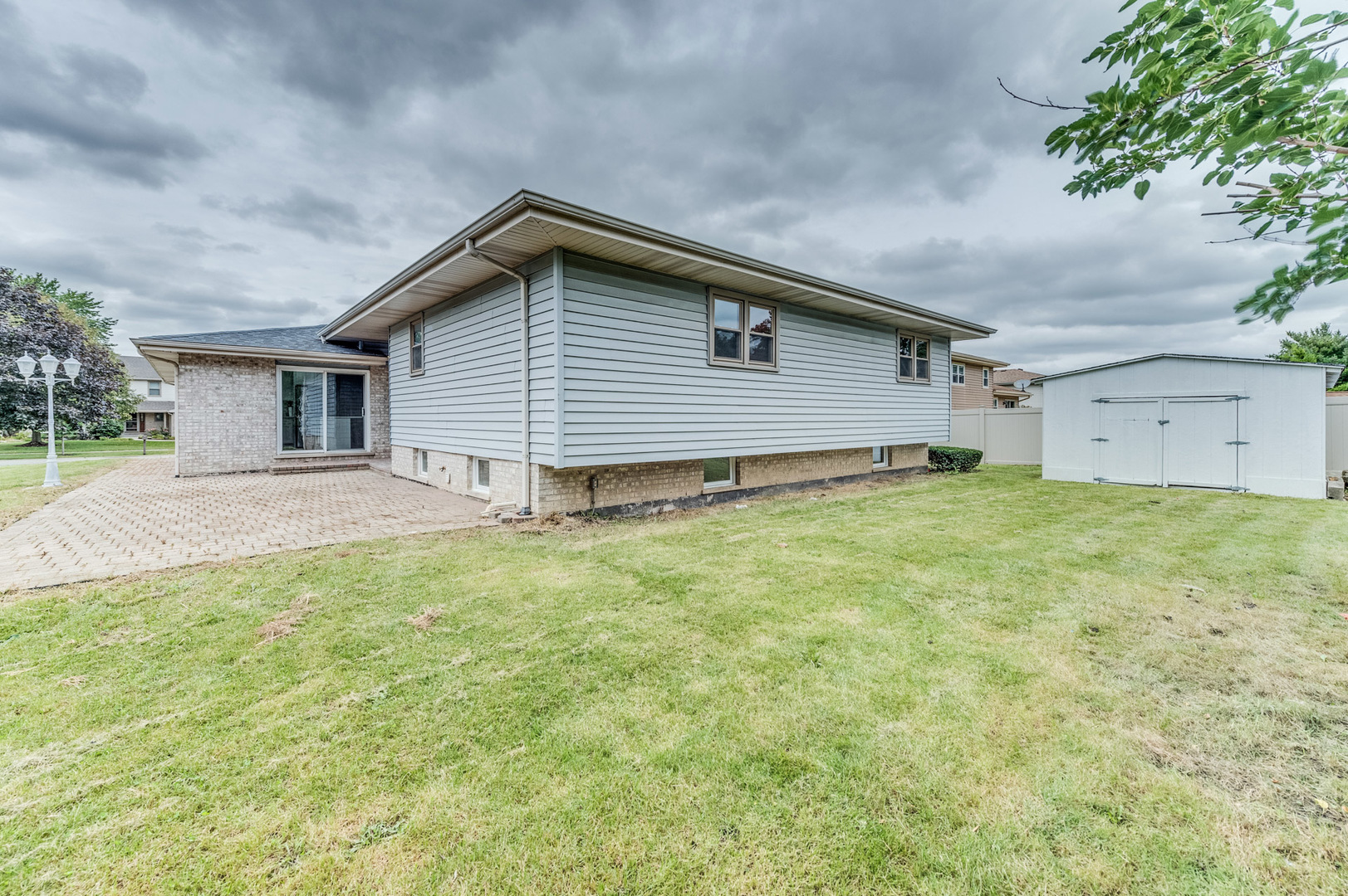 16539 Timberview Drive Plainfield, IL 60586 - Photo 26 of 26 a house view with a garden space