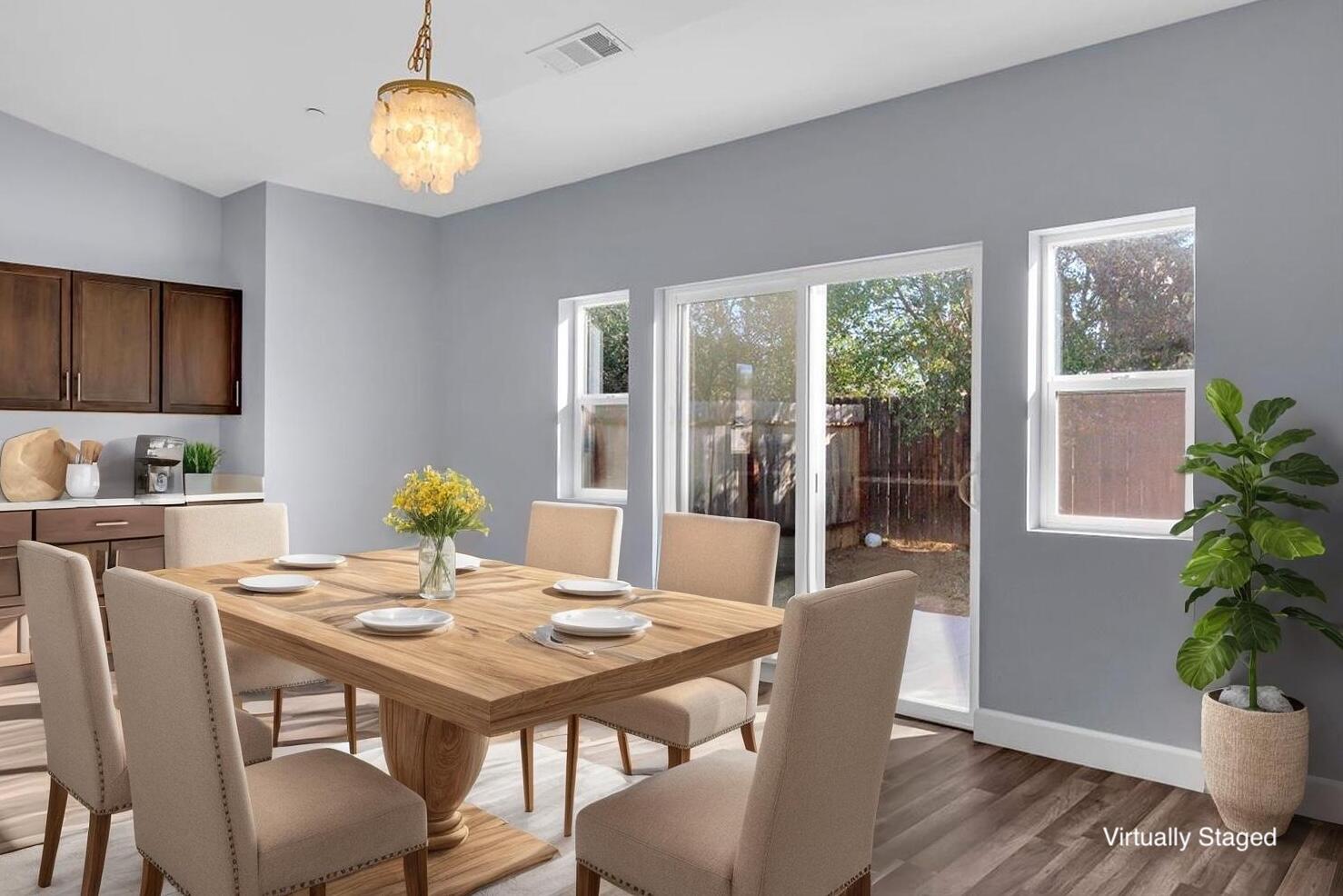 1565 Carl Court Red Bluff, CA 96080 - Photo 13 of 49 a view of a dining room with furniture window and wooden floor