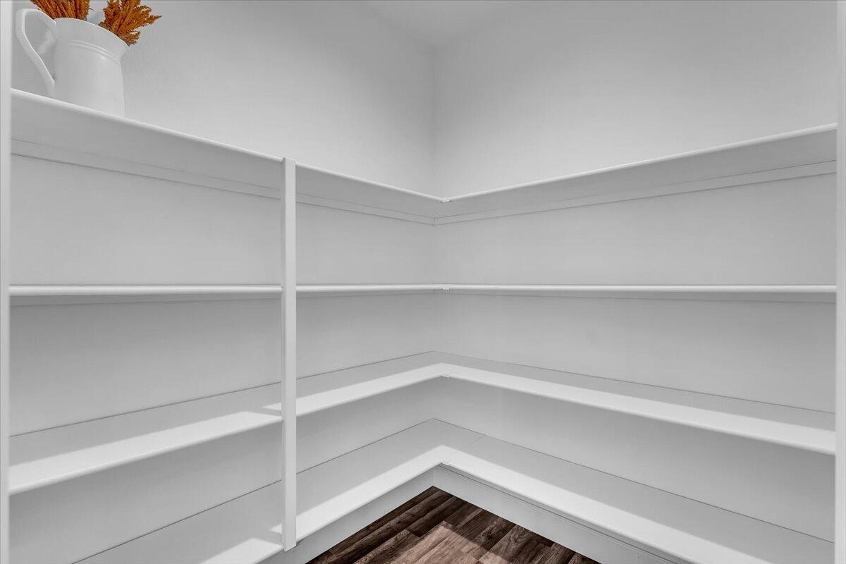 1565 Carl Court Red Bluff, CA 96080 - Photo 20 of 49 a storage room with wooden floor