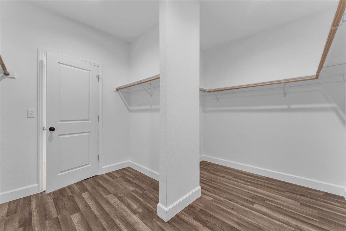 1565 Carl Court Red Bluff, CA 96080 - Photo 26 of 49 a view of empty room with wooden floor